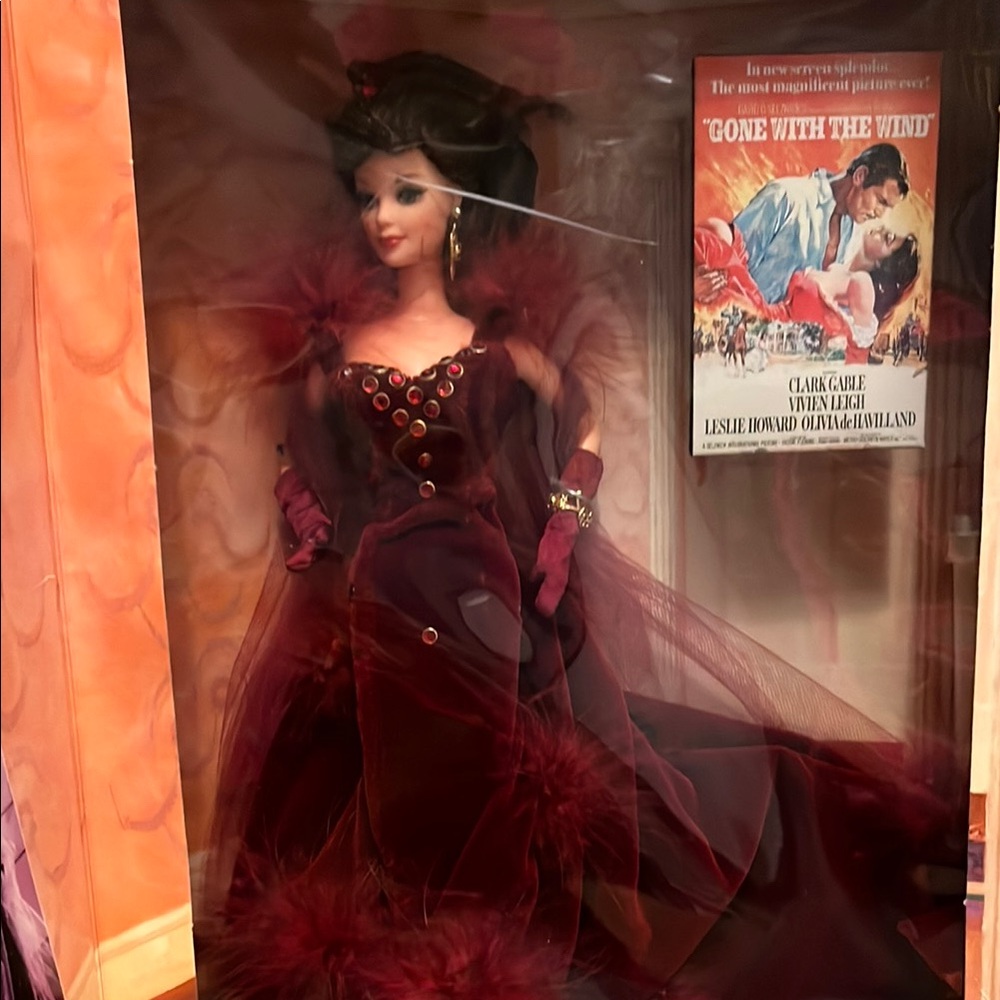 Elegant Burgundy Doll with Feather Details